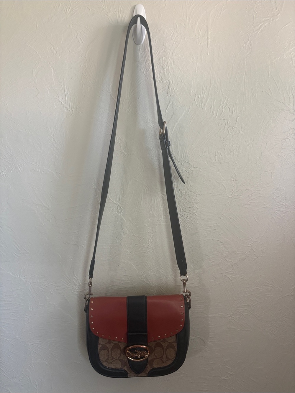 Coach Georgie Two-Tone Signature Saddle Crossbody in Brown and Red